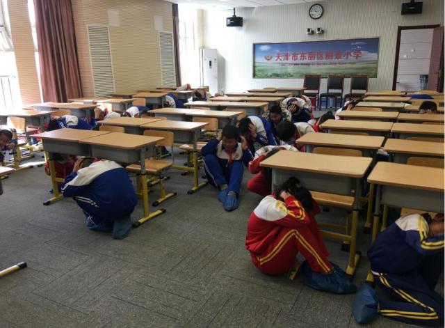 关爱生命救在身边东丽区红十字会联合丽景小学开展地震应急疏散演练